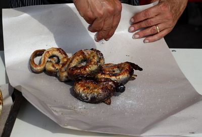 High angle view of man preparing food