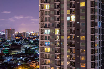 Illuminated buildings in city at night