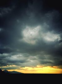 Scenic view of dramatic sky during sunset