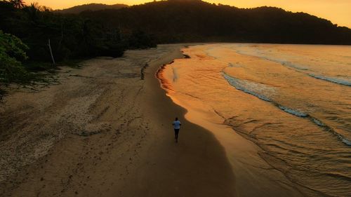 High angle view of man walking on land