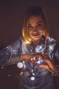 Portrait of smiling young woman