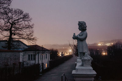 Statue of building against sky during winter