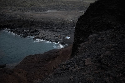 High angle view of rock formation at beach