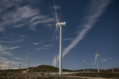 Windmills dot the mountainside near the mojave desert in cali