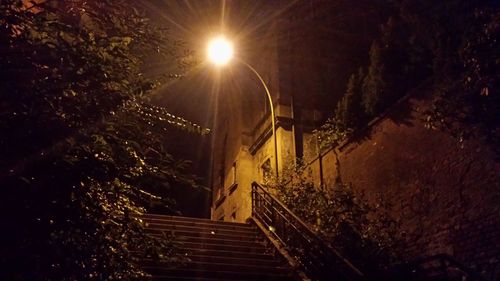 Illuminated street light at night