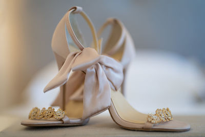 Close-up of shoes on table