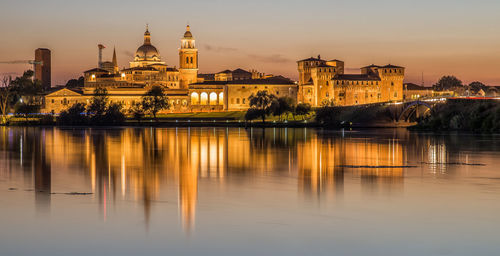 Reflection of illuminated buildings in water