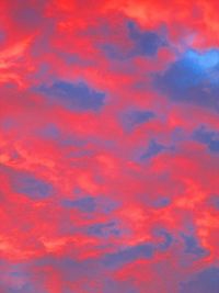 Low angle view of cloudy sky at sunset