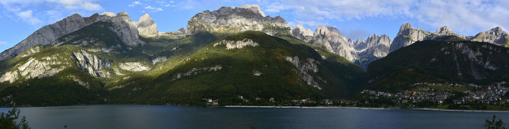 Panoramic view of lake and mountains against sky