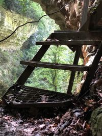 Old abandoned railroad track in forest