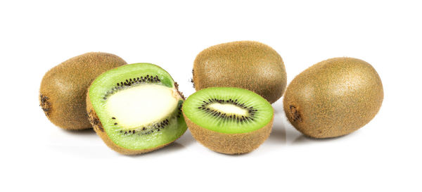 Close-up of fruits against white background