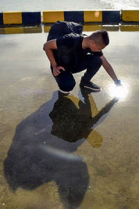 High angle view of boy in water