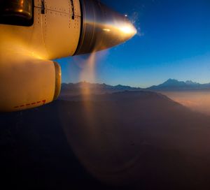 Close-up of airplane against clear sky