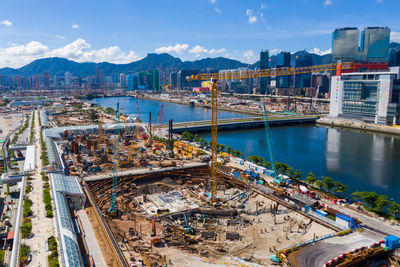 High angle view of harbor and buildings in city