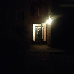 Empty illuminated building at night