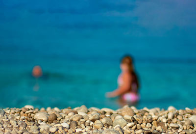 Woman on rocks at beach