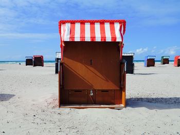 Hooded chairs on beach