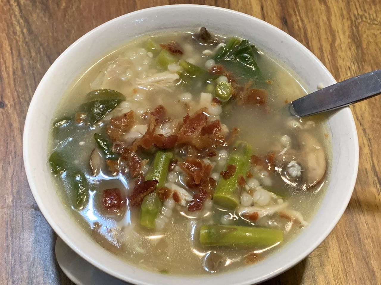 CLOSE-UP OF SOUP IN BOWL ON TABLE