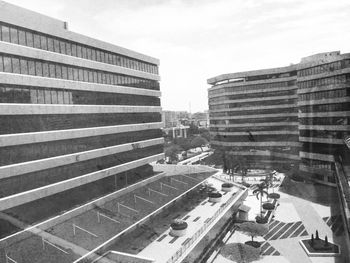 Buildings in city against sky