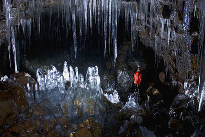 Exploring the cave buri close to the hellisheidi mountain in iceland