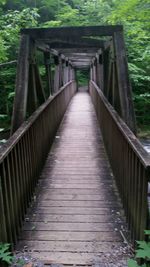 Footbridge amidst wooden bridge