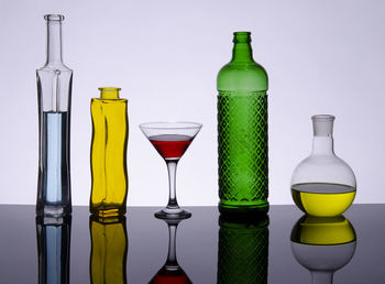 Close-up of wine bottles on table
