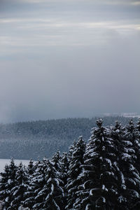 Scenic view of frozen lake against sky