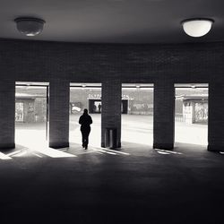 Full length of woman in corridor