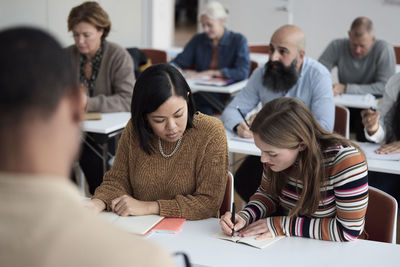 Group of adults sitting in class