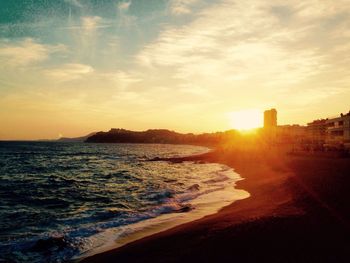 Scenic view of sea at sunset