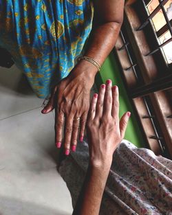 Midsection of woman with hands