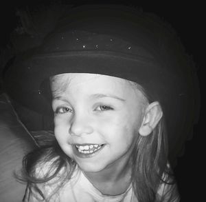 Close-up portrait of smiling girl