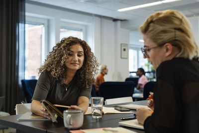 Businesswomen having meeting in office