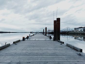 Pier over sea against sky