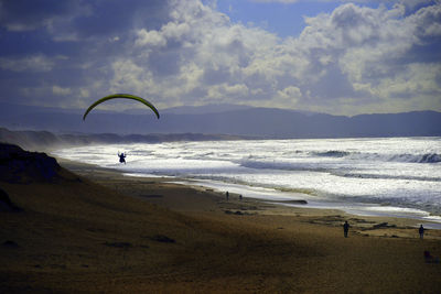 Scenic view of beach against sky