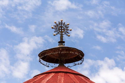 Low angle view of statue against sky