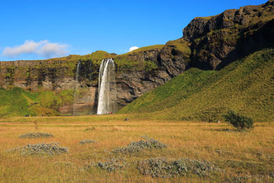 Scenic view of land against sky