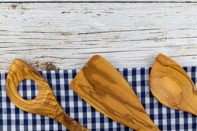 Directly above shot of wooden spoons on table