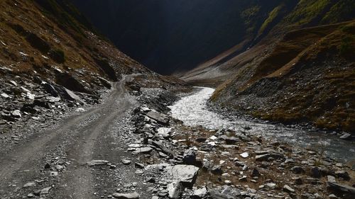 Water flowing through car on road