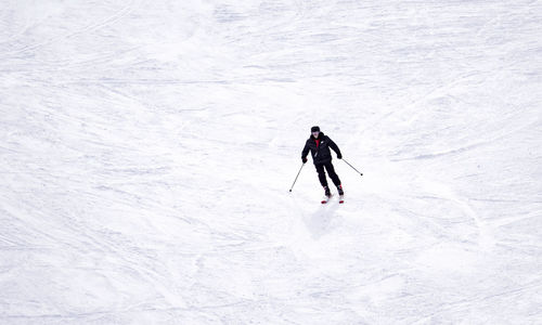 High angle view of person skiing on snow