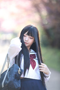 Teenage girl looking at camera