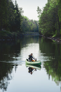 Man in boat on lake