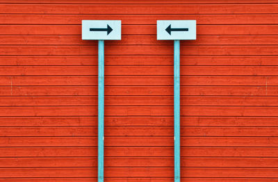 Information sign on red wall