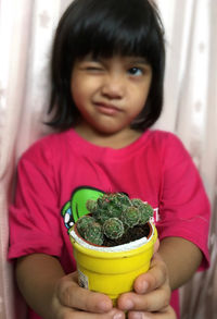 Portrait of a girl holding ice cream