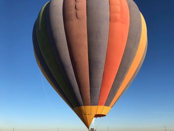 Hot air balloon flying in sky