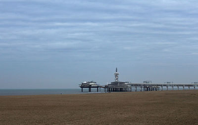 View of pier under overcast sky