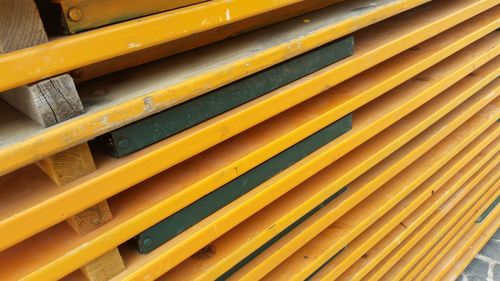 Close-up of folded chairs