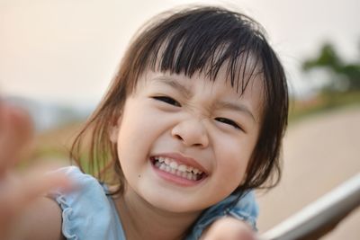 Close-up portrait of cute smiling girl