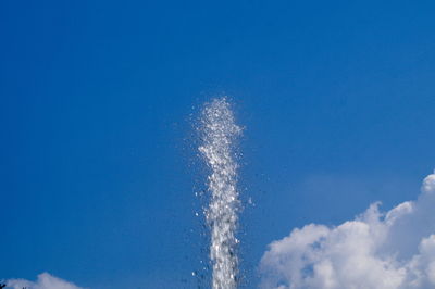 Low angle view of vapor trails in sky