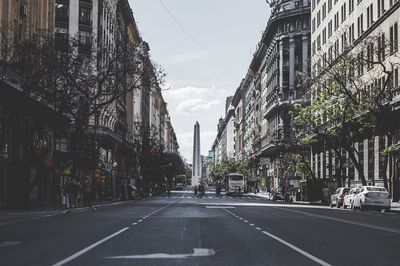 Street in city against sky